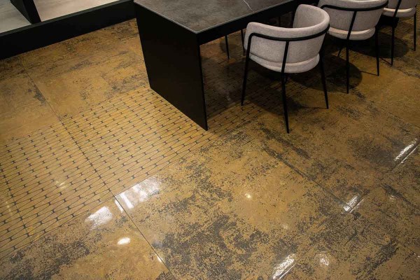 Descubre el efecto metal oxidado con la colección Illusion de Aparici Cerámica. Modernidad y personalidad en tu hogar con acabados brillantes.