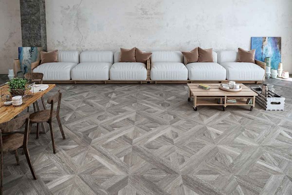 La colección Intarsio de Tuscania Ceramiche ofrece un pavimento de gres porcelánico con efecto madera de marquetería, perfecto para cualquier espacio.