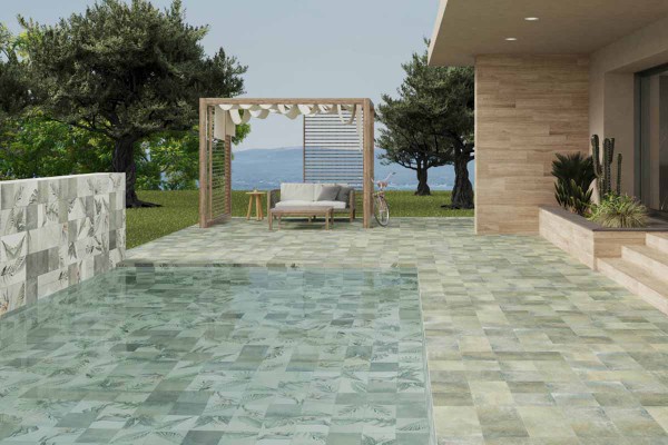 Porcelánico decorado efecto piedra Balinesa para interior de Piscina Nusa con decoraciones botanicas. Colección antideslizante para dentro y fuera de la piscina